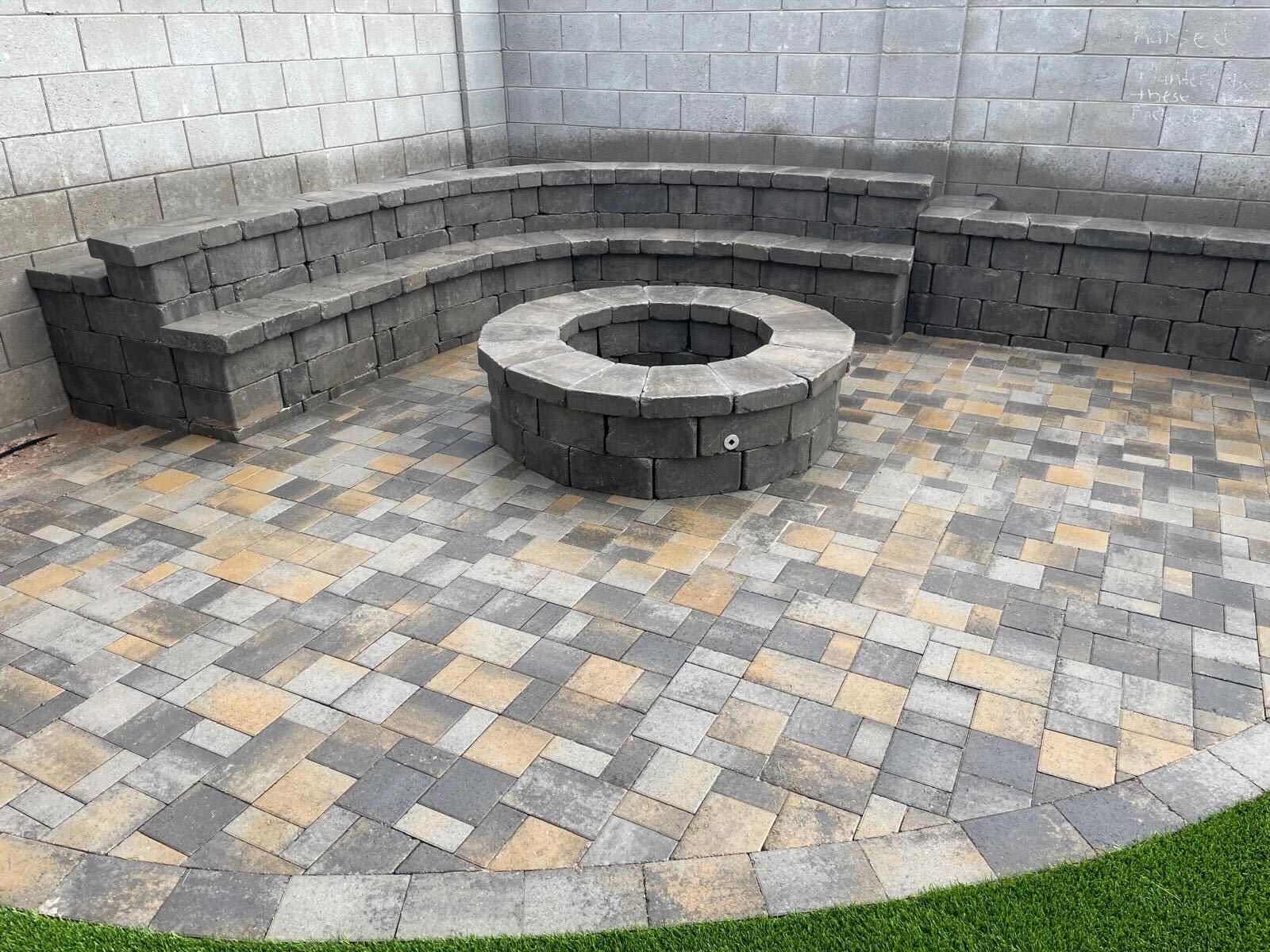 Custom outdoor kitchen installation — built-in grill and countertop in Arizona backyard
